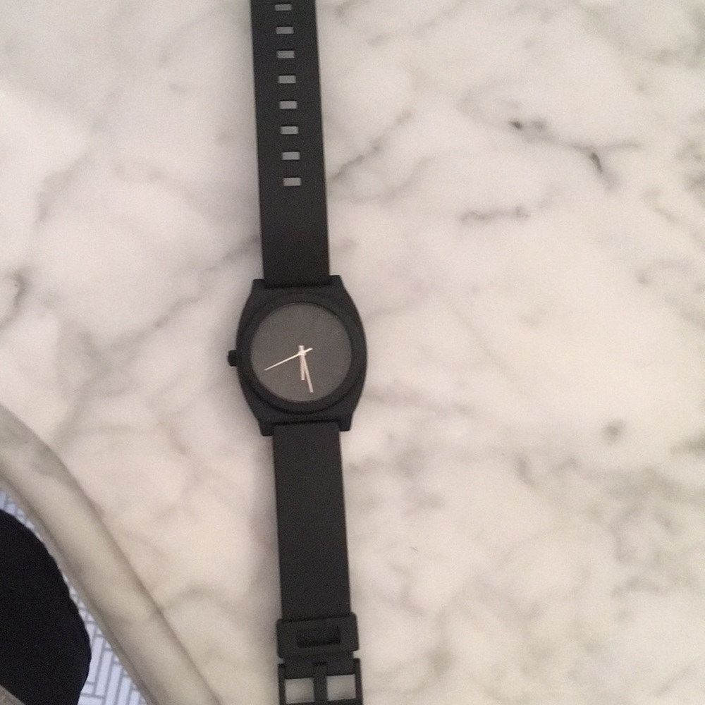 Nixon Time teller watch.